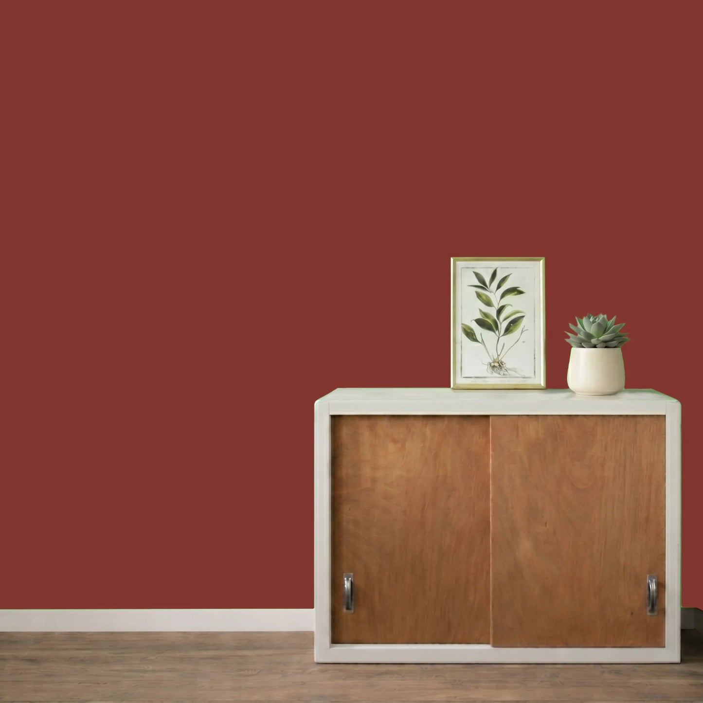 Mur repeint avec la couleur Antik rouge, peinture murale Éléonore Déco.