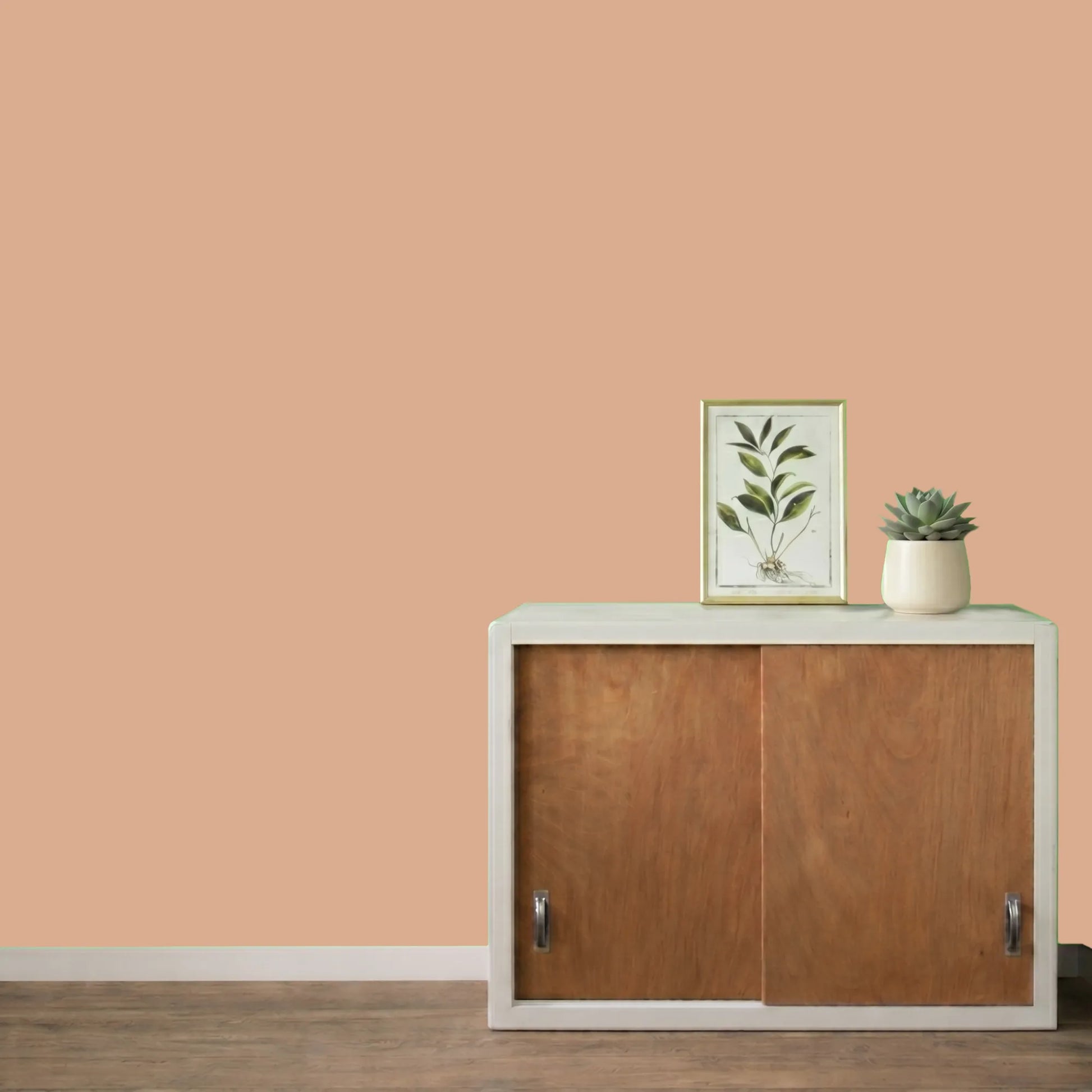 Mur repeint avec la couleur Biscuit rose, peinture murale Éléonore Déco.