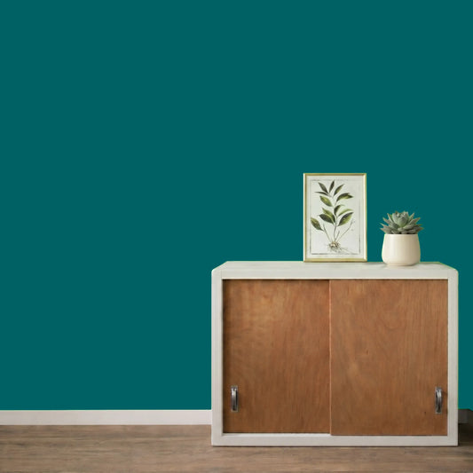 Mur repeint avec la couleur Bleu canard, peinture murale Éléonore Déco.