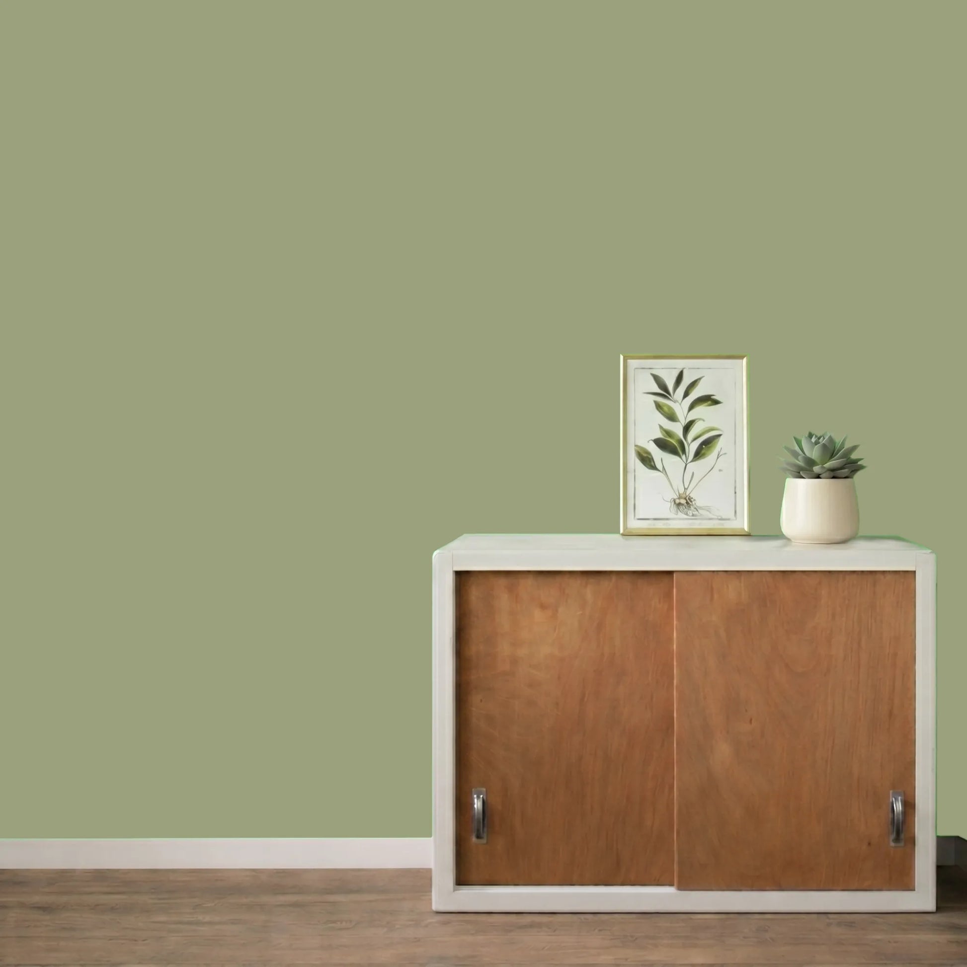 Mur repeint avec la couleur Guacamole, peinture murale Éléonore Déco.