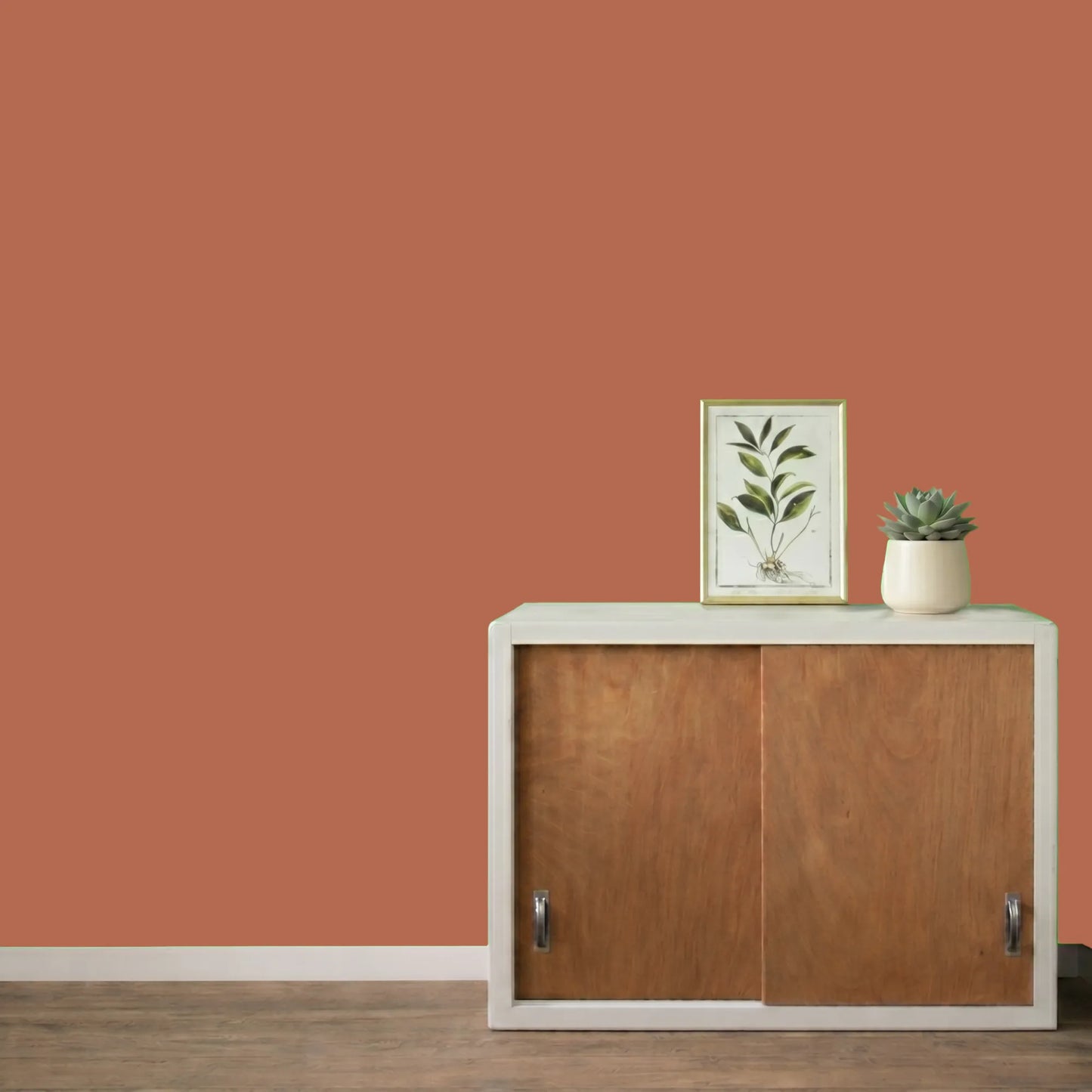 Mur repeint avec la couleur Terracotta, peinture murale Éléonore Déco.