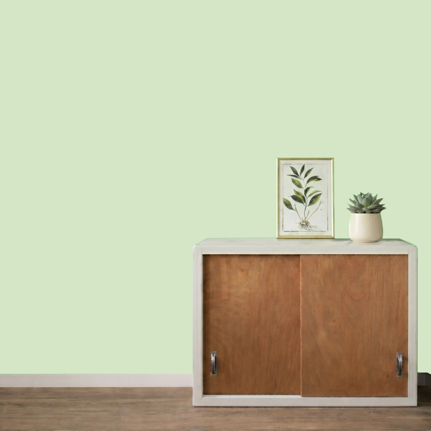 Mur repeint avec la couleur Vert d'eau, peinture murale Éléonore Déco.
